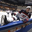 TORONTO, CANADA - DECEMBER 28: USA's Luke Kunin #9 sticks his tongue out while stretching by the bench during warm up before taking on Slovakia in the preliminary round of the 2017 IIHF World Junior Championship. (Photo by Matt Zambonin/HHOF-IIHF Images)

